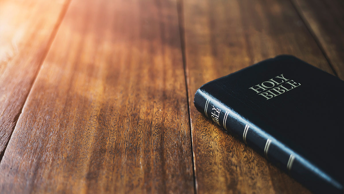 A Bible sits on a table