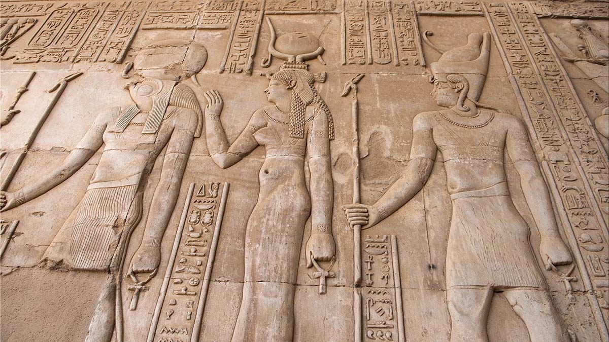 A wall of hieroglyphs in Egypt, featuring Egyptian gods