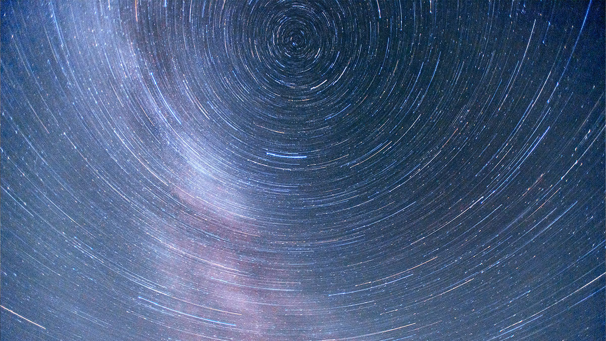 The stars in the sky spiral as the Earth spins